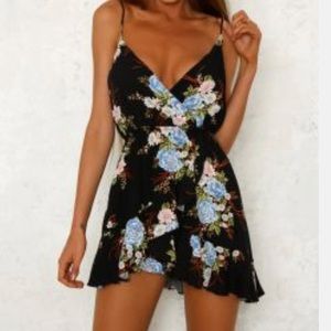 Black floral romper disguised as a mini dress!